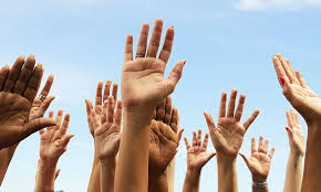 Volunteers helping students